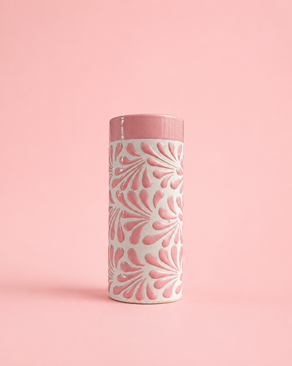 Tumbler with floral pattern on a pink background