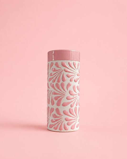 Tumbler with floral pattern on a pink background