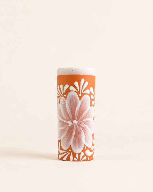 Cylindrical cup with a floral design 